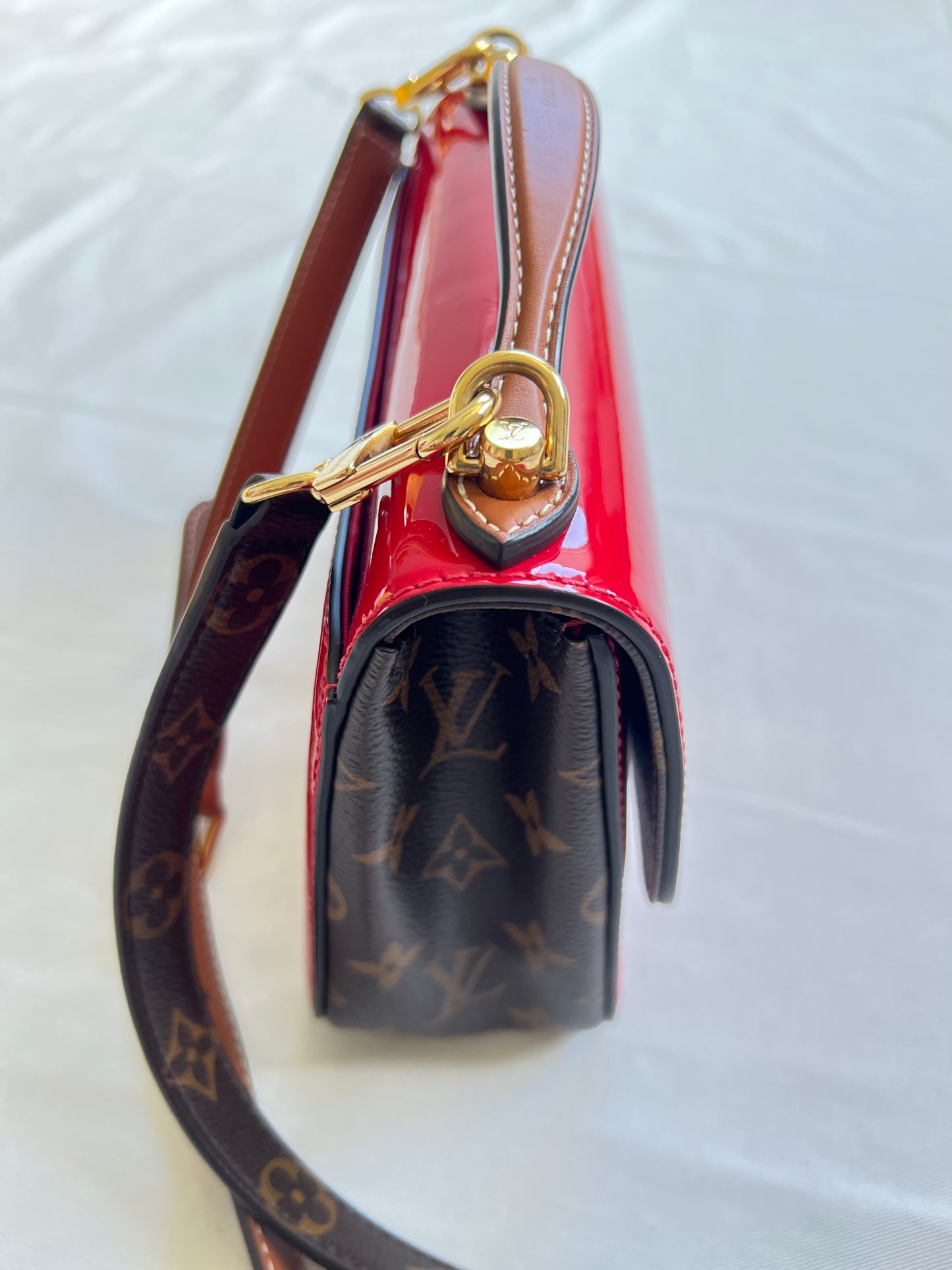 LOUIS VUITTON 
Patent Calfskin Monogram Cherrywood BB Scarlet