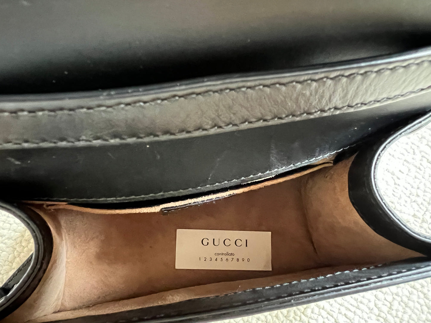 GUCCI 
Calfskin Mini Sylvie Top Handle Bag Black