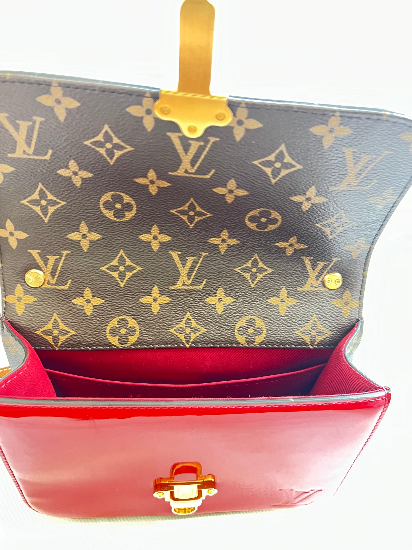 LOUIS VUITTON 
Patent Calfskin Monogram Cherrywood BB Scarlet