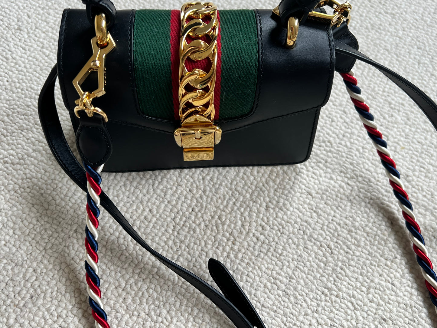 GUCCI 
Calfskin Mini Sylvie Top Handle Bag Black