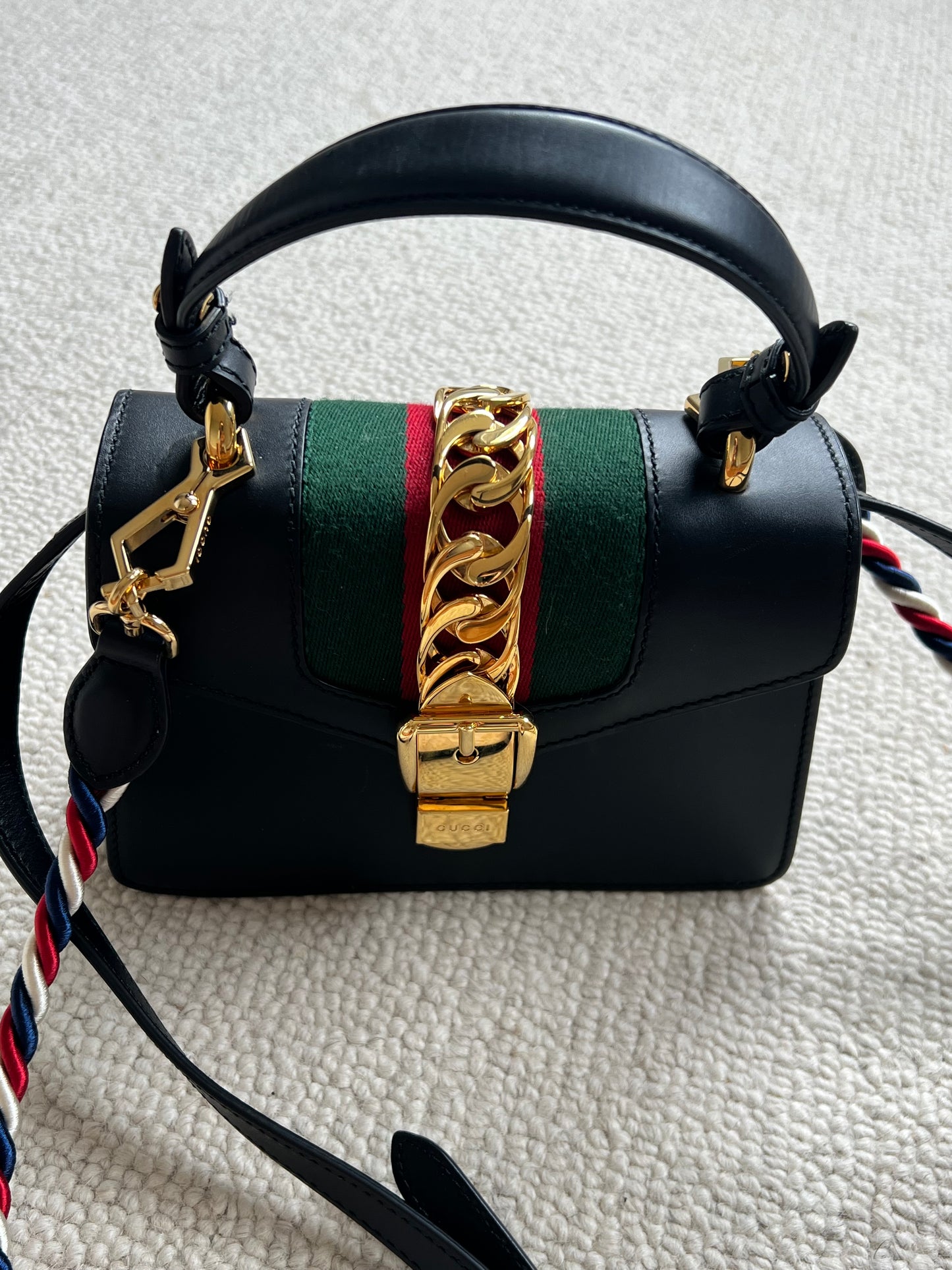 GUCCI 
Calfskin Mini Sylvie Top Handle Bag Black